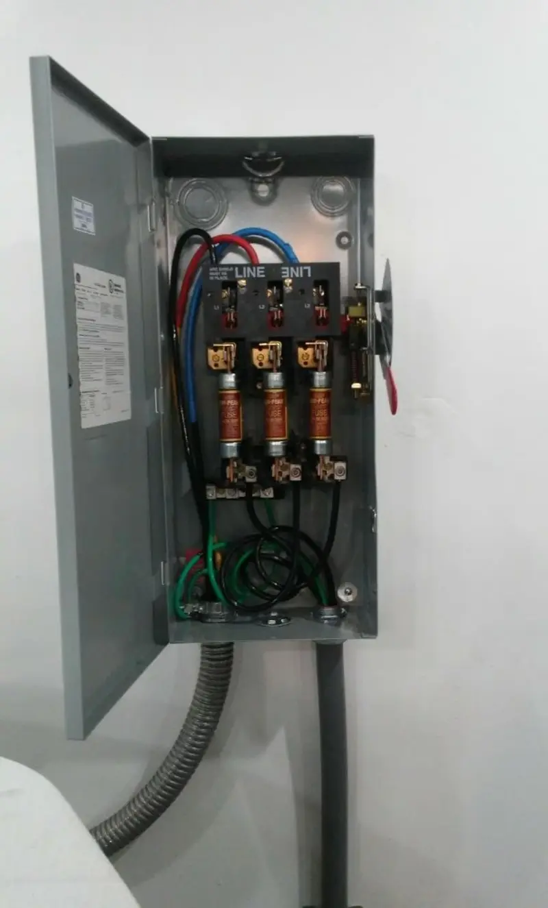 Three-phase disconnect switch installed for Smoke Detector Installation in Friendly